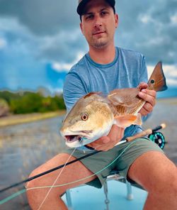 Reeling in the trophy: a giant Red Drum!